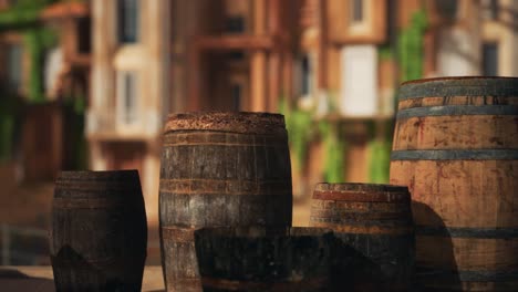 old wooden wine barrels in a sea town port