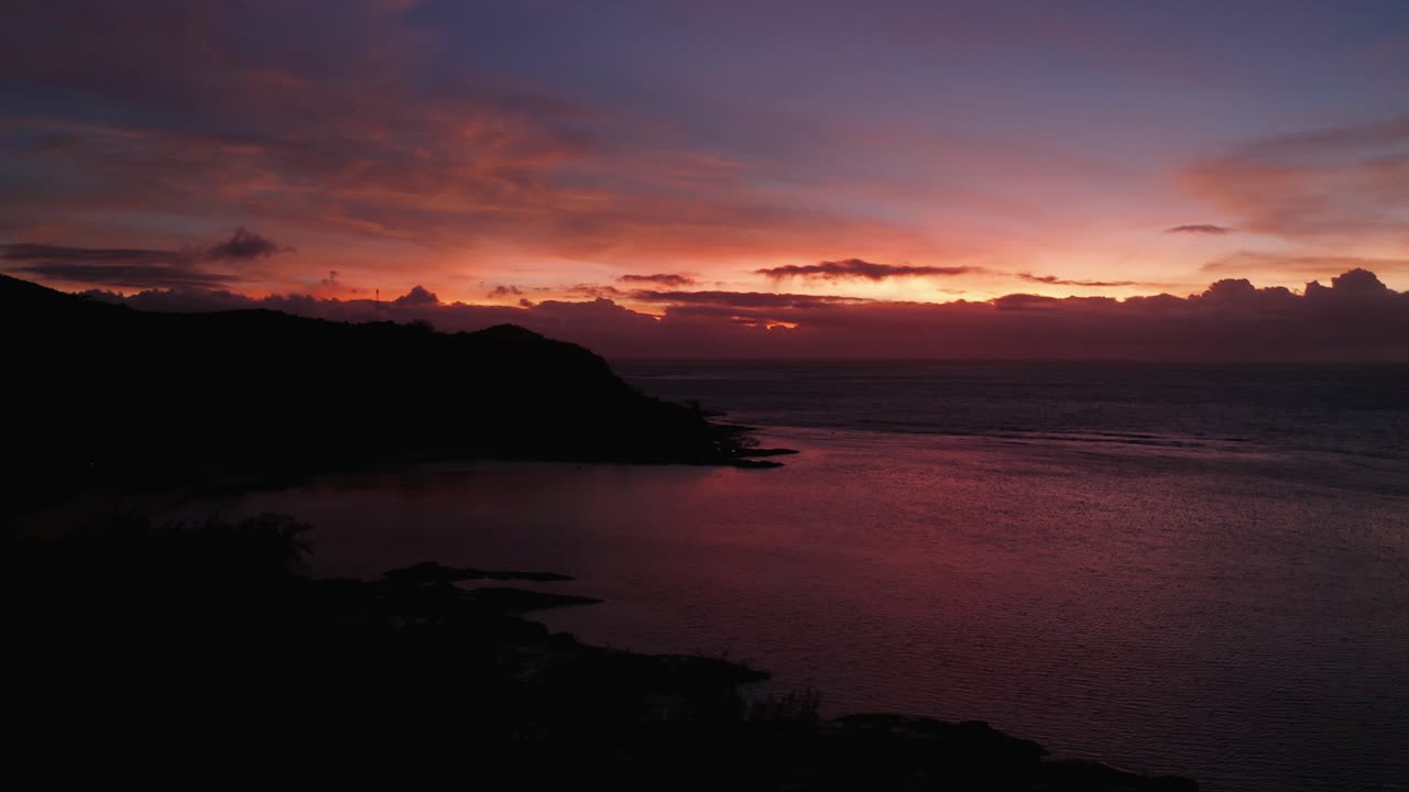 A Dramatic And Vibrant Sunset In Fiji Island - A Relaxing Scenic Attraction On A Summer Vacation - Aerial Shot