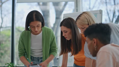 young colleagues brainstorming together office closeup. diverse team creating