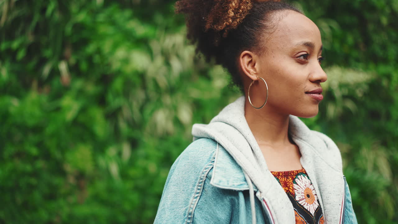 Portrait of a Smiling Woman in Denim Jacket