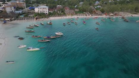 aerial view of wooden fisherman boats and sandy beach at kendwa village, zanzibar,tanzania