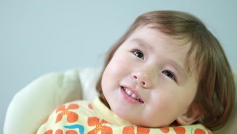 Little-Girl-Toothy-Smile-Face-Close-up