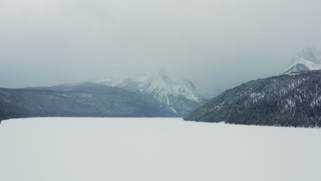 aerial over redfish lake with sawtooth mountains in background