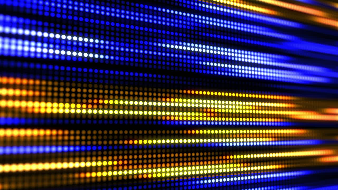 Bright glowing yellow blue diodes. Movement festive illumination lines. Blurred electronic display. Looped motion graphics.