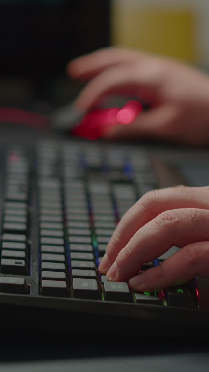 Close-up of Hands Typing on a Gaming Keyboard