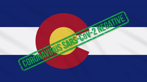 colorado us state swaying flag with green stamp of freedom from coronavirus, loop