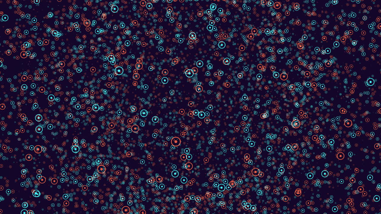 Dynamic and vibrant pattern created from blue and red circles and dots, forming a swirling and pulsating design with clusters in the center and on the edges, giving a sense of movement and energy