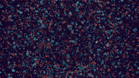 dynamic and vibrant pattern created from blue and red circles and dots, forming a swirling and pulsating design with clusters in the center and on the edges, giving a sense of movement and energy
