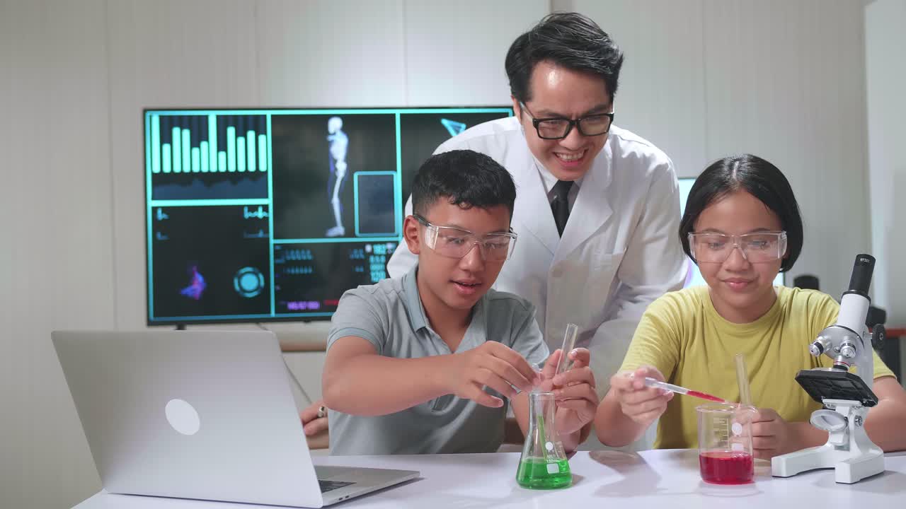 Excited Young Asian Boy And Girl Learning Science Experiment In Laboratory With Teacher In Classroom. Study With Scientific Equipment And Test Tubes