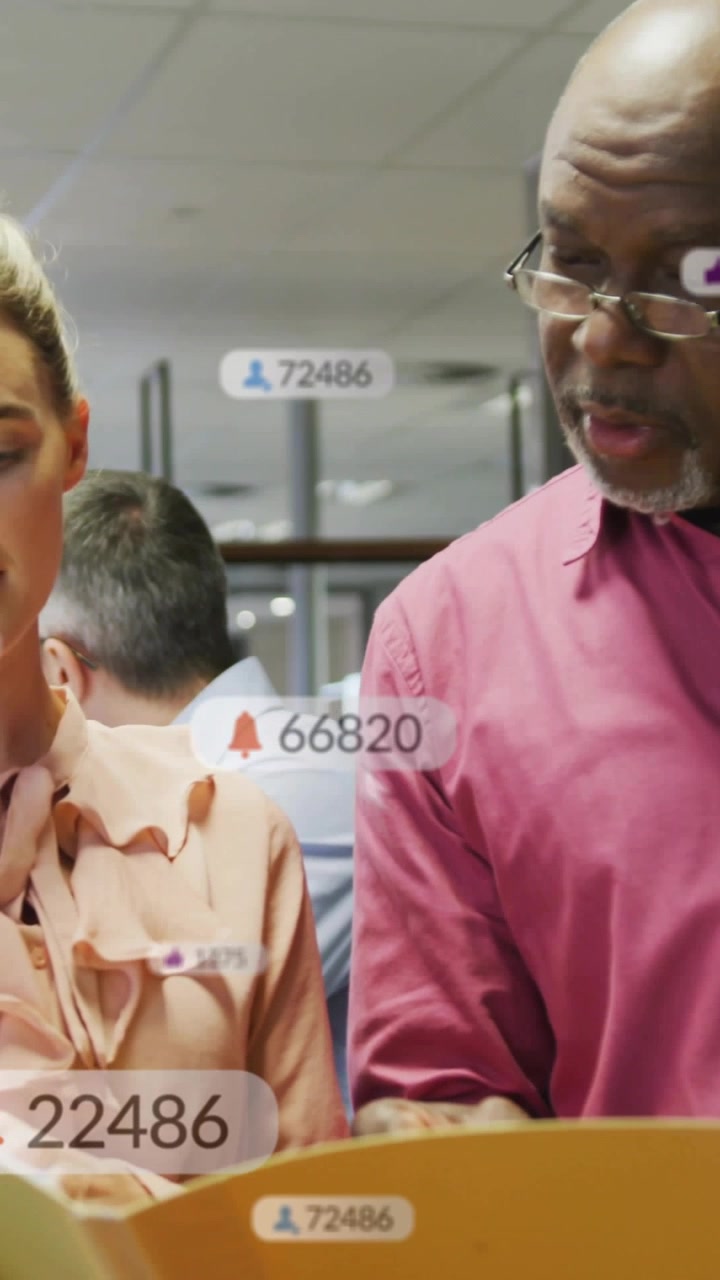 Vertical video: Woman opening folder, man pointing, office alerts updating counts for review