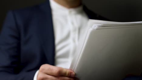 man reading documents