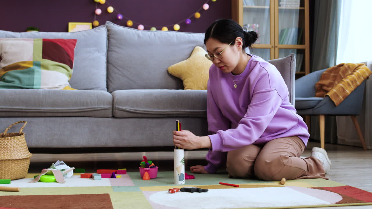 Pregnant woman sitting in living room