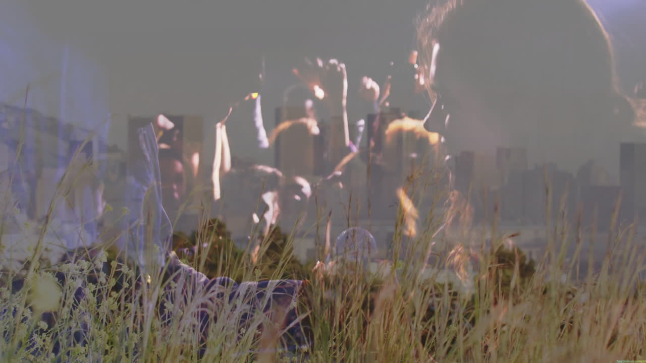 Singer and bandmates performing music in field, featuring mic and grasses overlaid on city skyline
