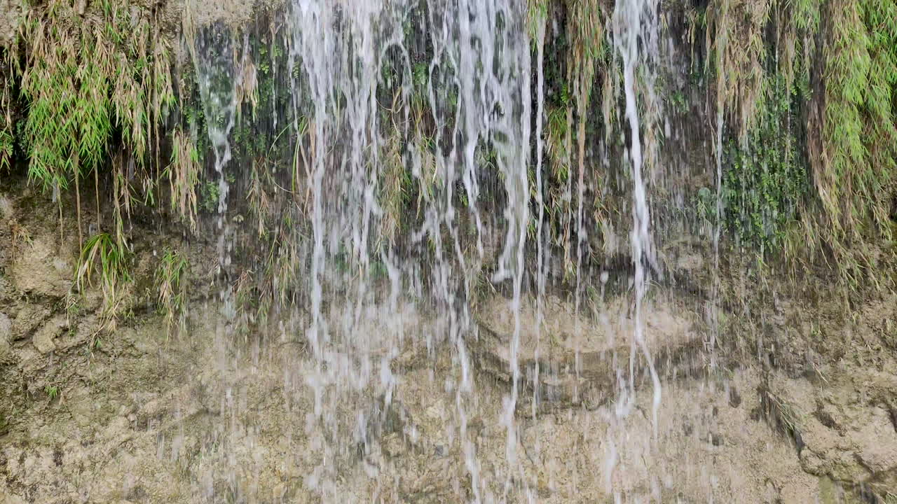 Beautiful natural waterfall falling down the hills