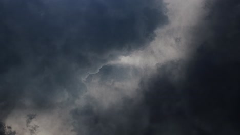 thunderstorms-and-cumulonimbus-clouds-moving-with-lightning-strikes