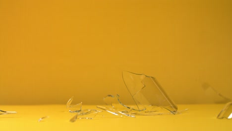 broken glass on yellow background