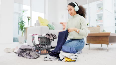 clean, house and woman folding laundry on living