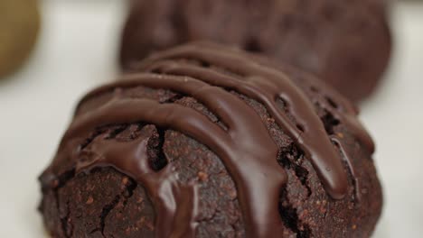 fresh brownie chocolate cookies in bakery shop close-up. artisan sweets and bread is making by skill bakers using natural and high-quality ingredients. food with health and flavour benefits. sweet breads for dessert and breakfast. bakery shop and market