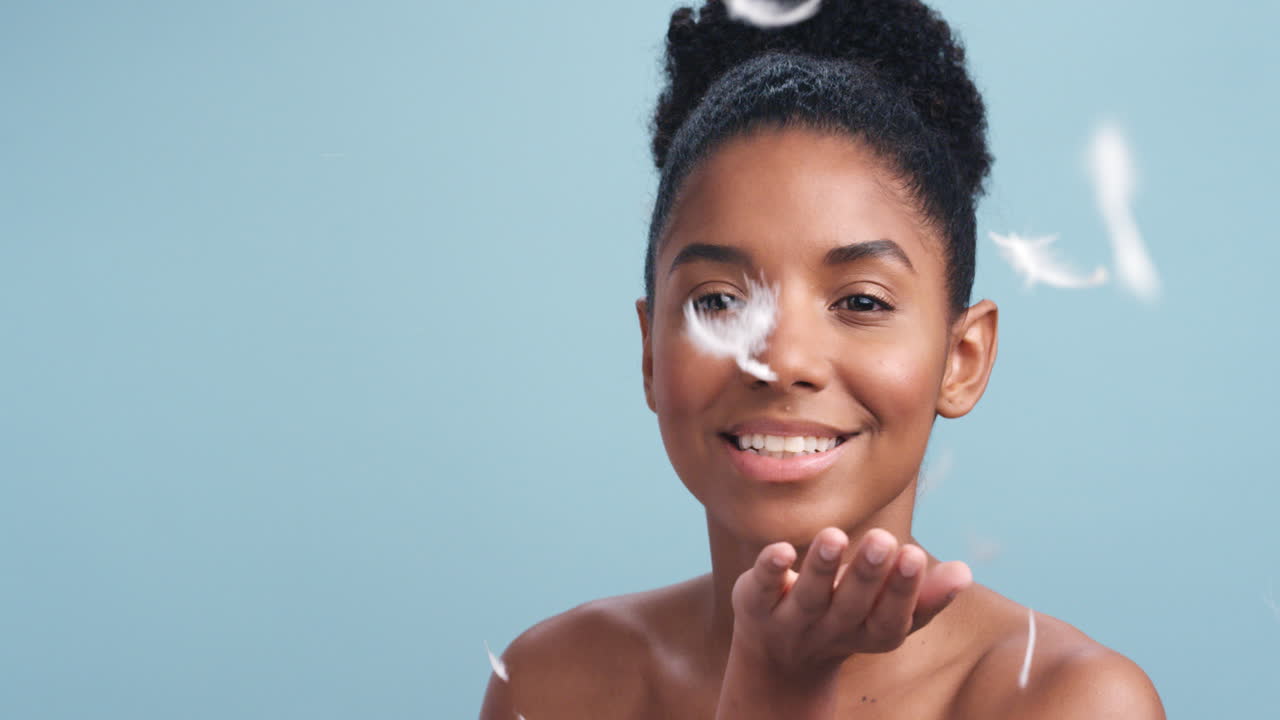 Feather soft skin, beauty woman portrait in studio