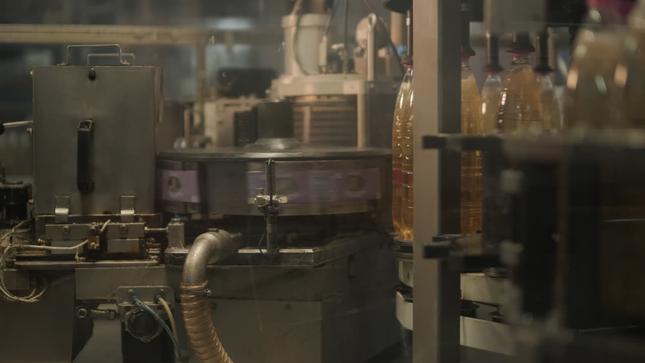 Automated Bottle Labeling Machine in a Beverage Factory