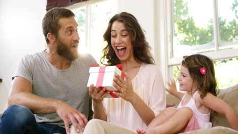 excited mother receiving a gift