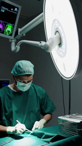 surgeon performing a medical procedure in an operating room