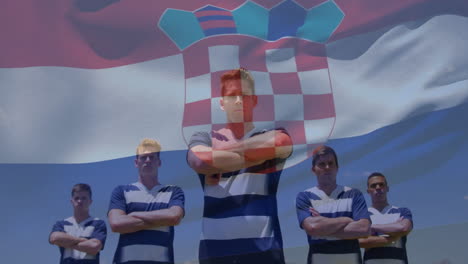 animation of flag of croatia over diverse rugby players crossing arms