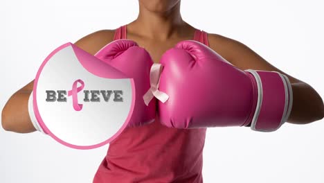 Animation-of-breast-cancer-awareness-text-over-biracial-female-boxer