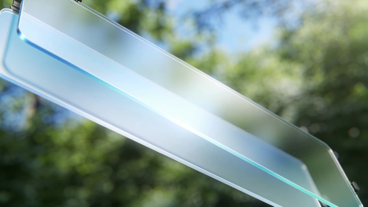 Sunlight causing three frosted panels sliding diagonally over soft canopy, showing clamp and flare