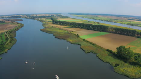 aerial shot of drone flying above dead vistula in pomeranian, poland