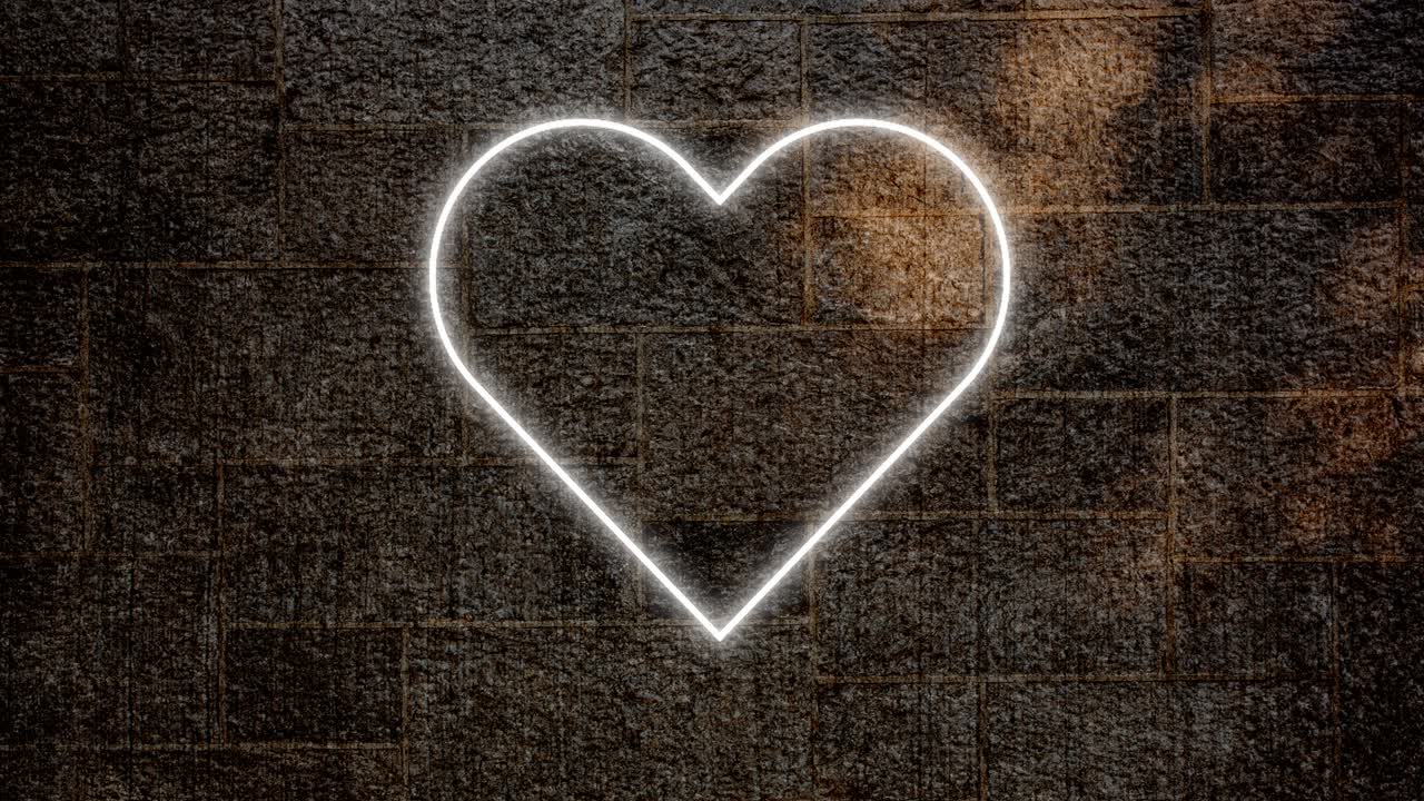 animación de un icono de corazón de neón parpadeante en una pared de ladrillo