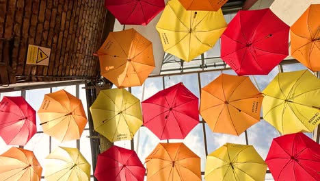 vibrant umbrellas hanging in camden town, london