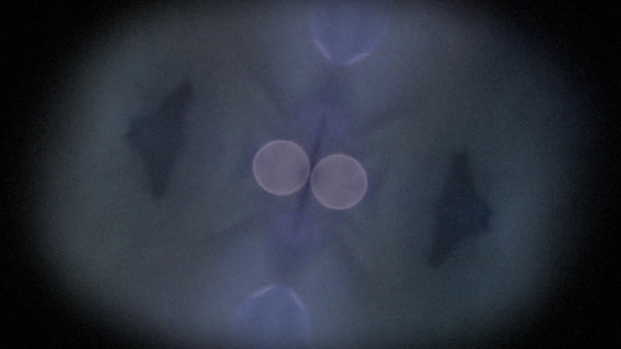 animación de puntos de luz reloj con fondo oscuro