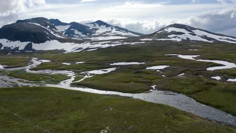 river and sylarna mountains in the summer