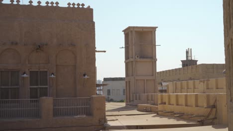 Heritage-Culture-With-Wind-Catcher-Against-Sunny-Sky-In-Al-Fahidi-Historical-District,-Dubai-UAE