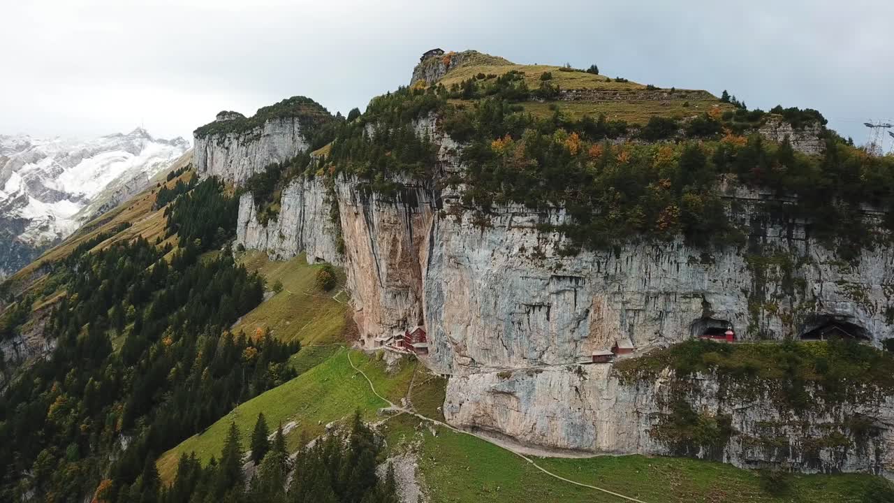 Aerial View of Swiss Alps Mountain with Cliffside Caves