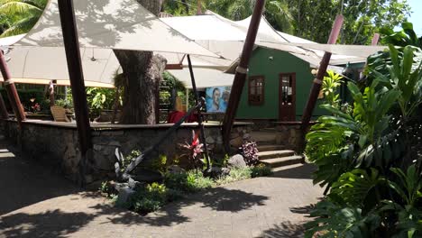 relaxing restaurant patio with tropical garden and anchor decor