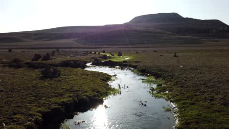 Flowing-Stream-and-Fresh-Water-with-Sun-Reflection