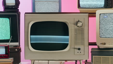 collection of vintage television sets