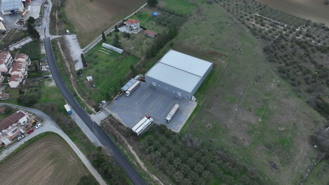 Large warehouse for the production of water and soda and storage for the transportation of products.