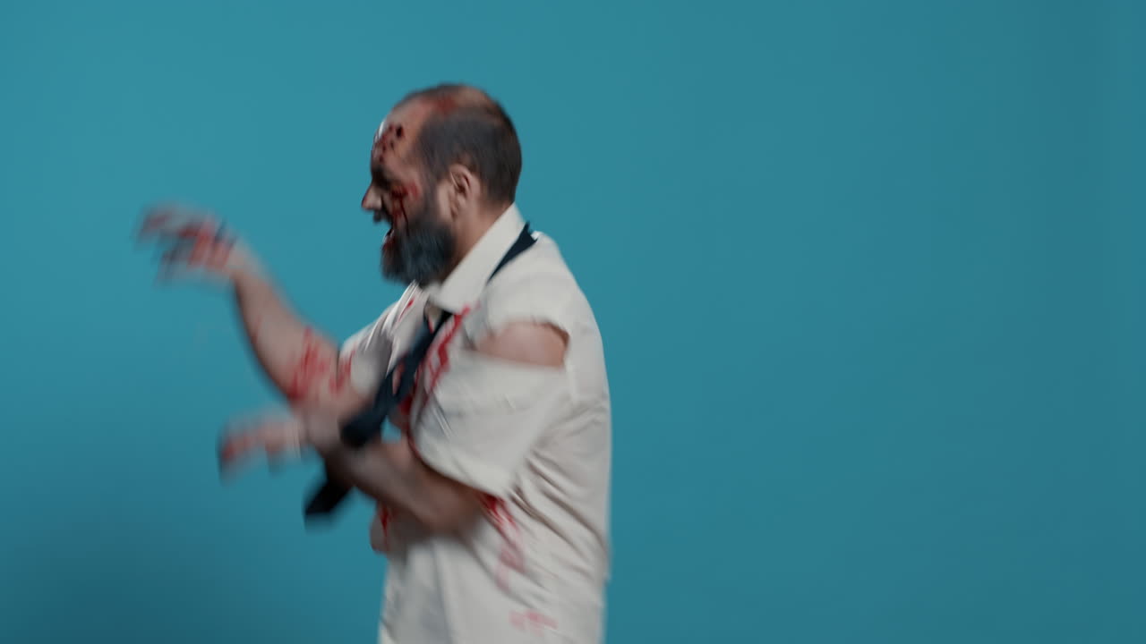 Scary looking brain-eating doing a funny dance on blue background