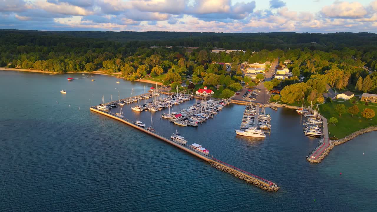 Blue color of lake Michigan and cozy marina, aerial drone view