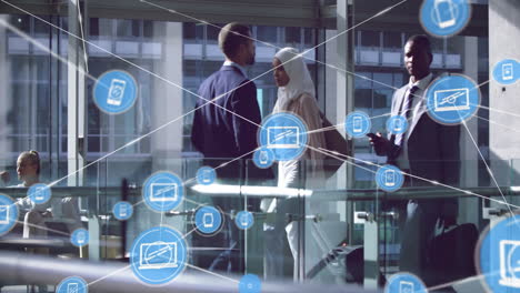 animation of network of connections with icons over diverse colleagues talking