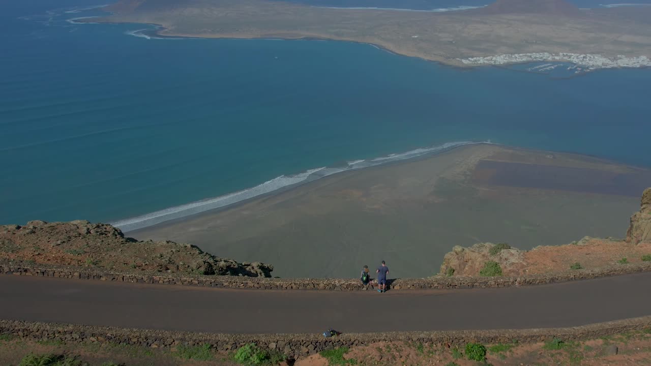 Aerial drone view of mountain sea and volcanoes in Lanzarote, Canary Islands, Spain