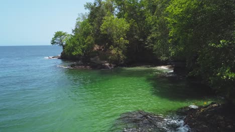 footage of a relaxing beach in the caribbean sea on the north coast of trinidad