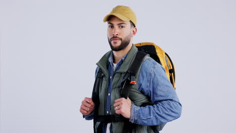 hombre, cara y viajar con mochila