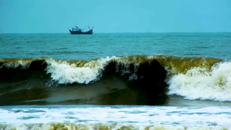 it’s kicking-up a storm, trawler boat in the indian ocean