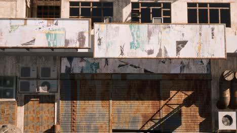 camera moving in front of rundown and dilapidated shops and storefronts, permanently closed due to the economic fallout from a global pandemic