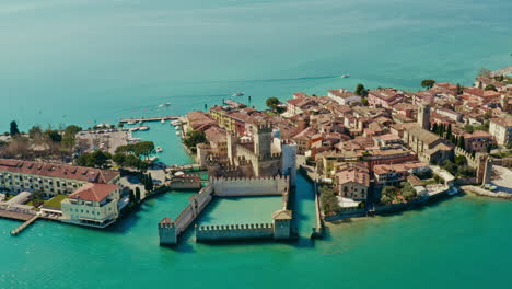 Drone-shot-over-sirmione-castle,-Garda-Lake,-Italy