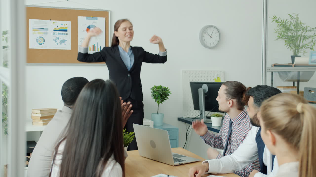 Successful Team Celebrating Success in Office